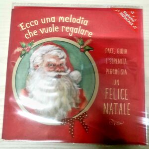 BIGLIETTO NATALE MUSICALE CON SCRITTA "ECCO UNA MELODIA CHE VUOLE REGALARE PACE, GIOIA E SERENITA' PERCHE' SIA UN FELICE NATALE